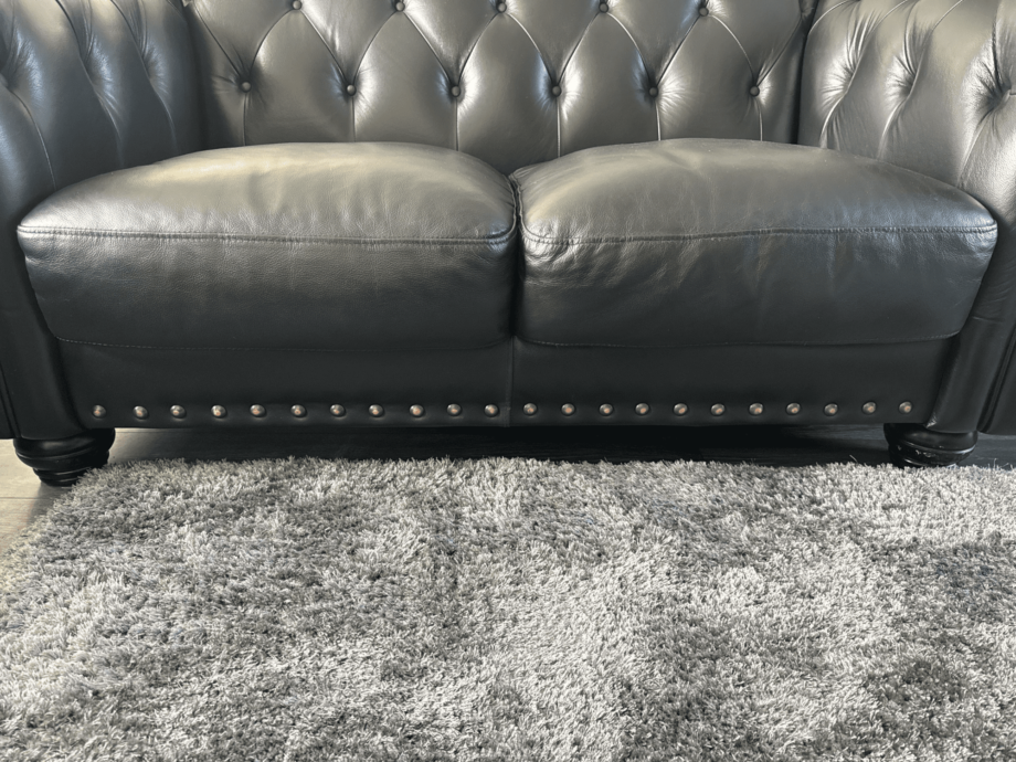 Littlewoods Black Leather 2 Seater and 2 Chairs