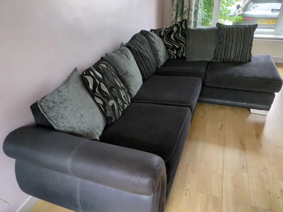 DFS Black Corner Sofa with Scatter Back Cushions