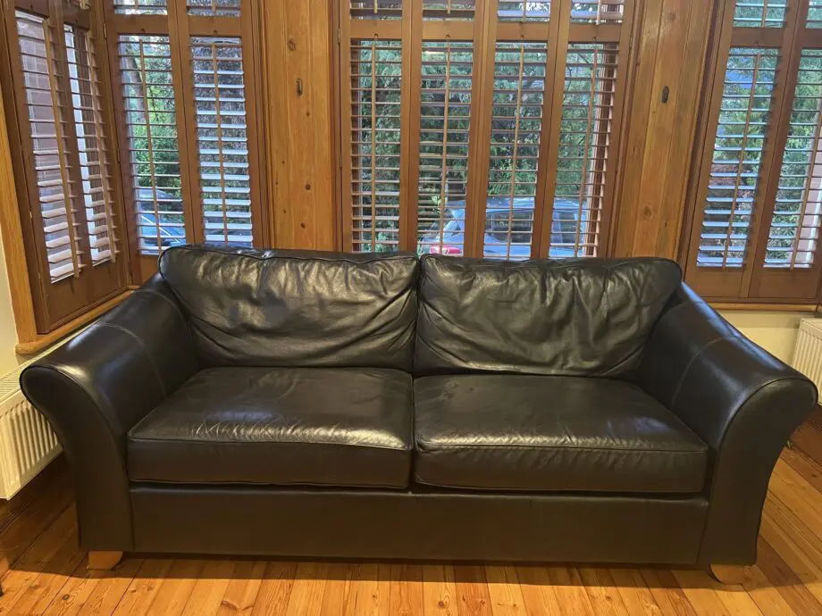 M&S black leather sofas