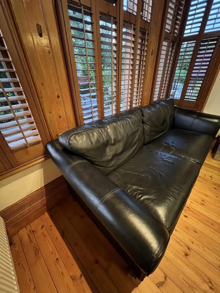 M&S black leather sofas