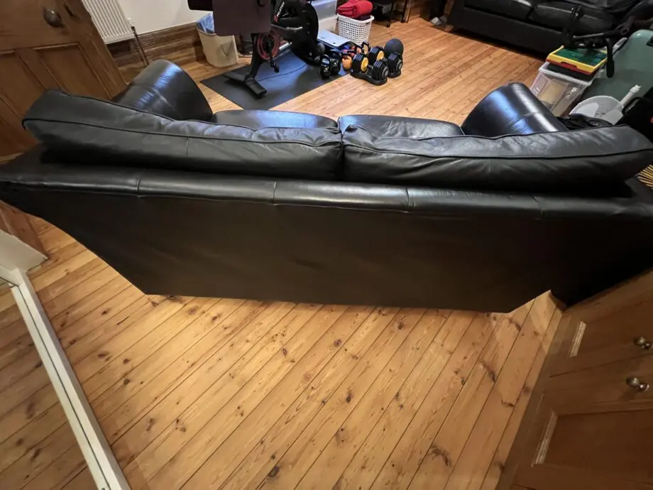 M&S black leather sofas