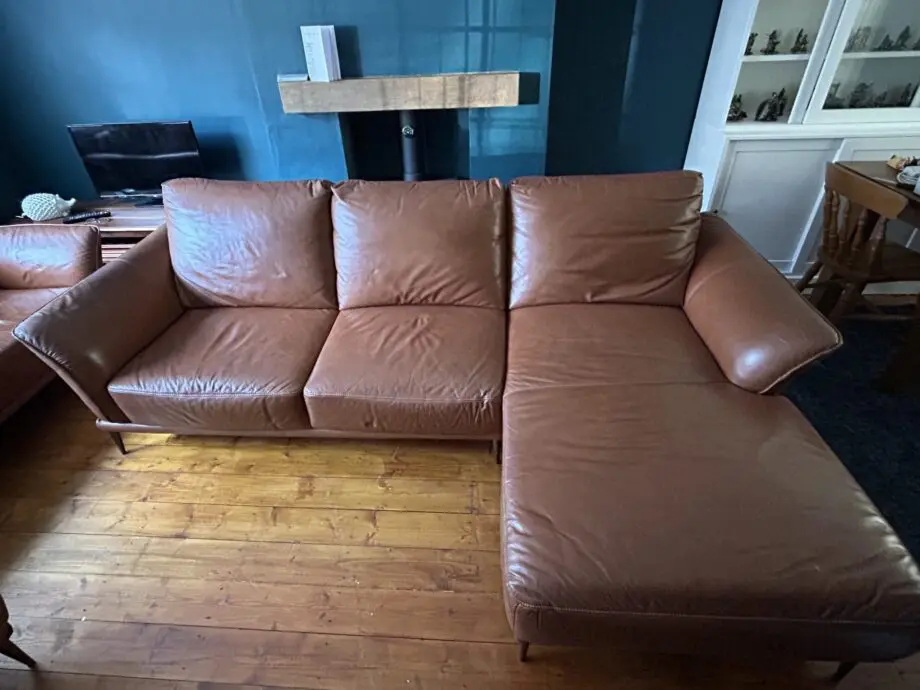 Brown large leather L-shaped sofa
