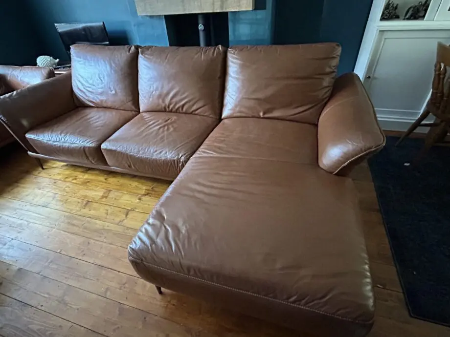 Brown large leather L-shaped sofa