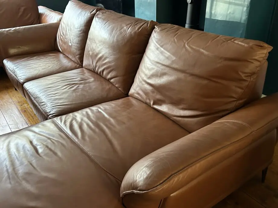 Brown large leather L-shaped sofa
