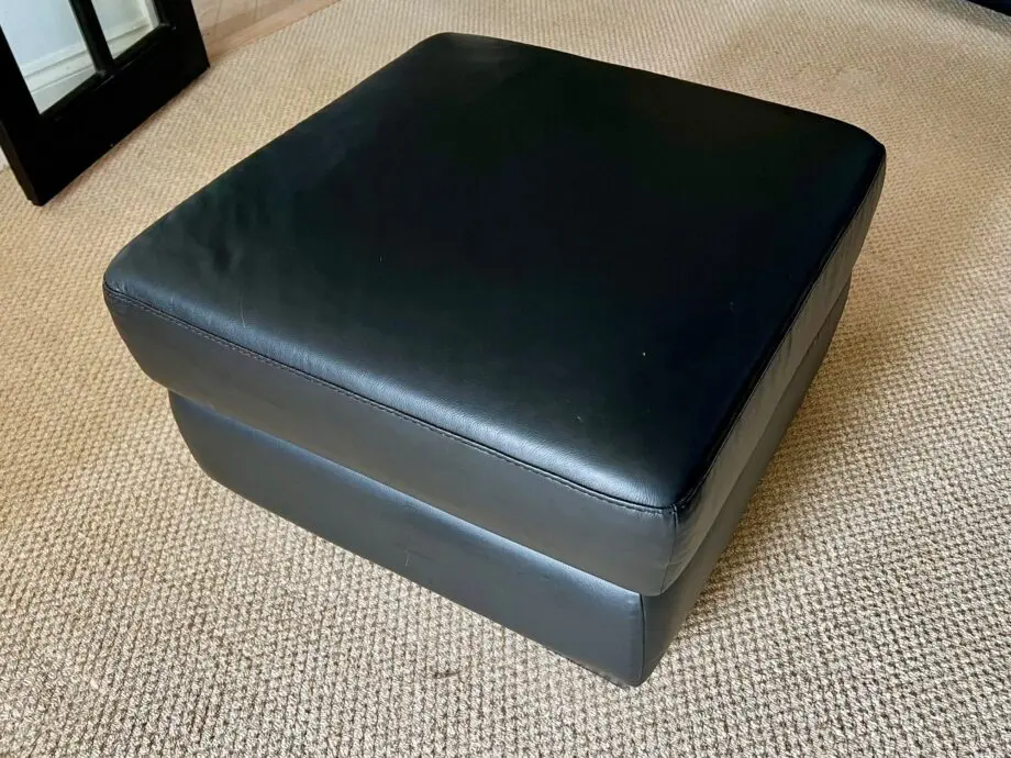 DFS Black Leather 3 and 2 Seater Sofas with matching footstool