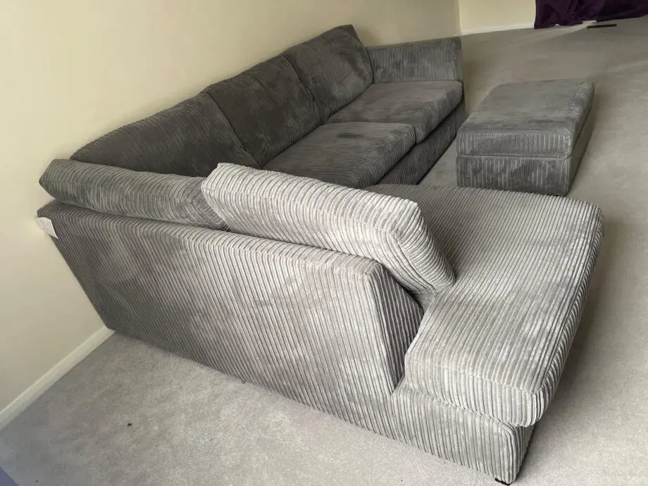 DFS Grey Cord Corner Sofa and Matching Footstool