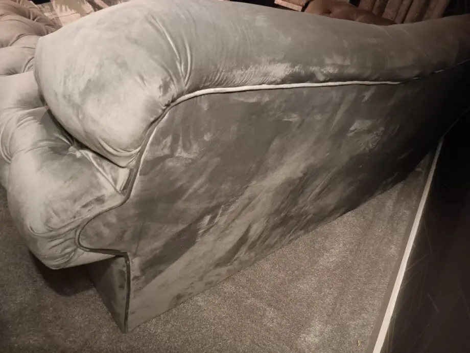 Grey velour Chesterfield 2/3 seater sofa and puffa
