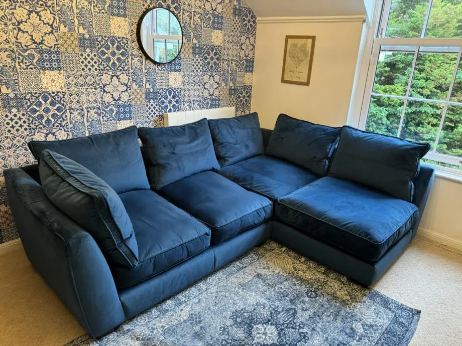 Dfs blue velvet left facing sofa