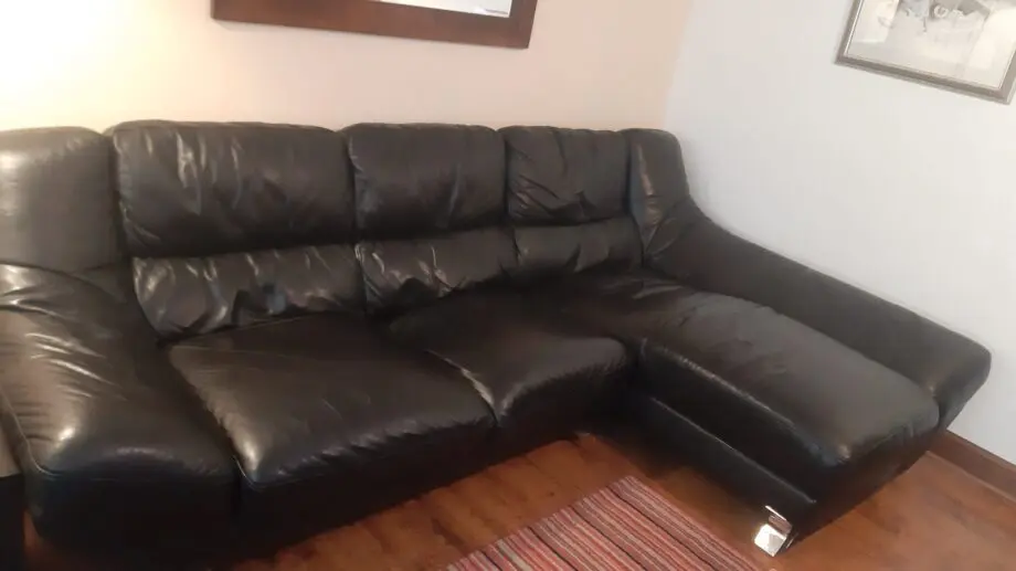 Black leather corner sofa