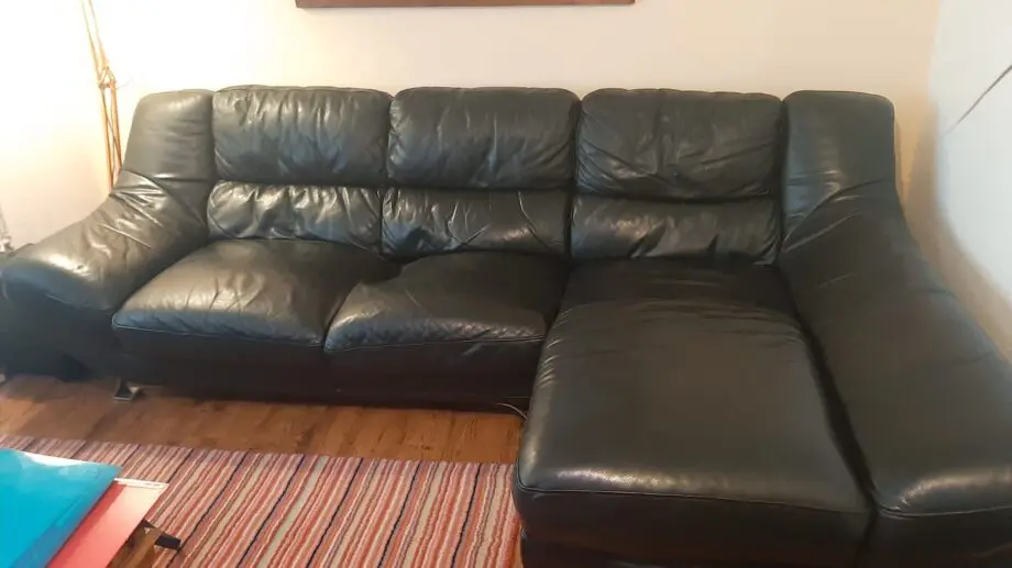 Black leather corner sofa