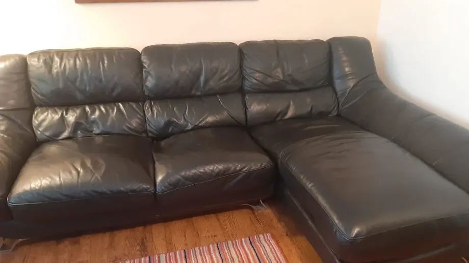 Black leather corner sofa