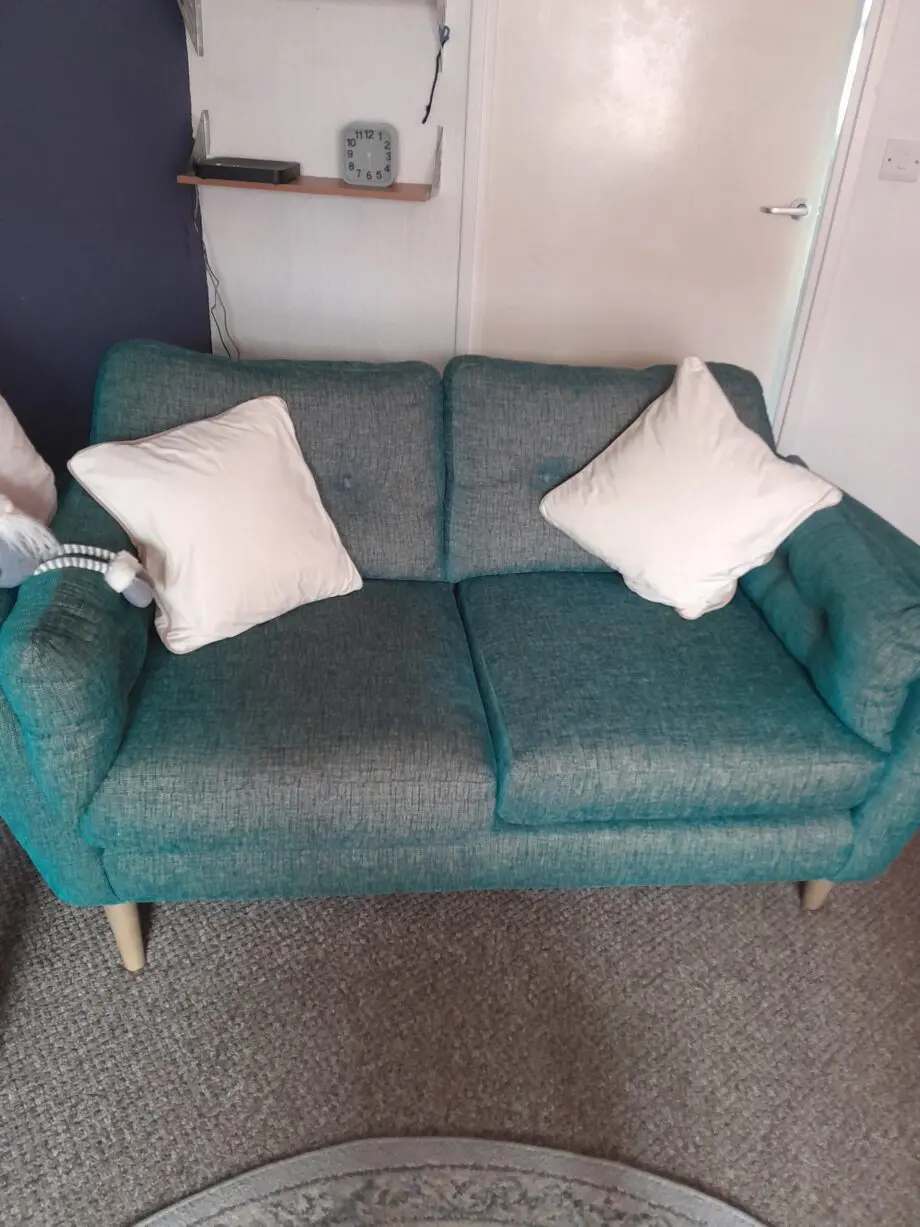 Taskers hand made teal colour 2 seater sofa