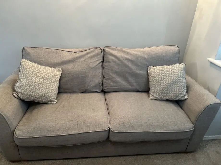 1X 3 Seater sofa with 2 large “snuggle” chairs both in grey with matching throw pillows
