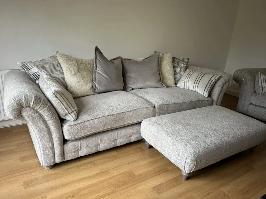 Furniture village three piece suite. Four seater, two seater snuggler & ottoman