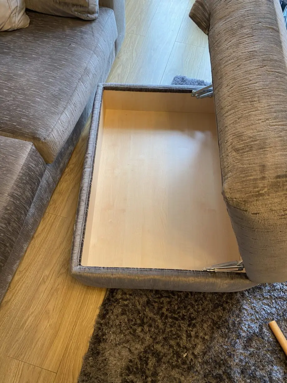 Large grey sofa with ottoman footstool