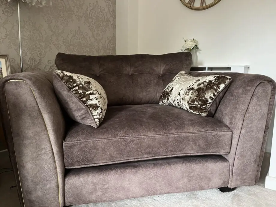 Two Seater Snuggler & footstool - Furniture Village - Ariana - Dapple Chocolate with brass insert