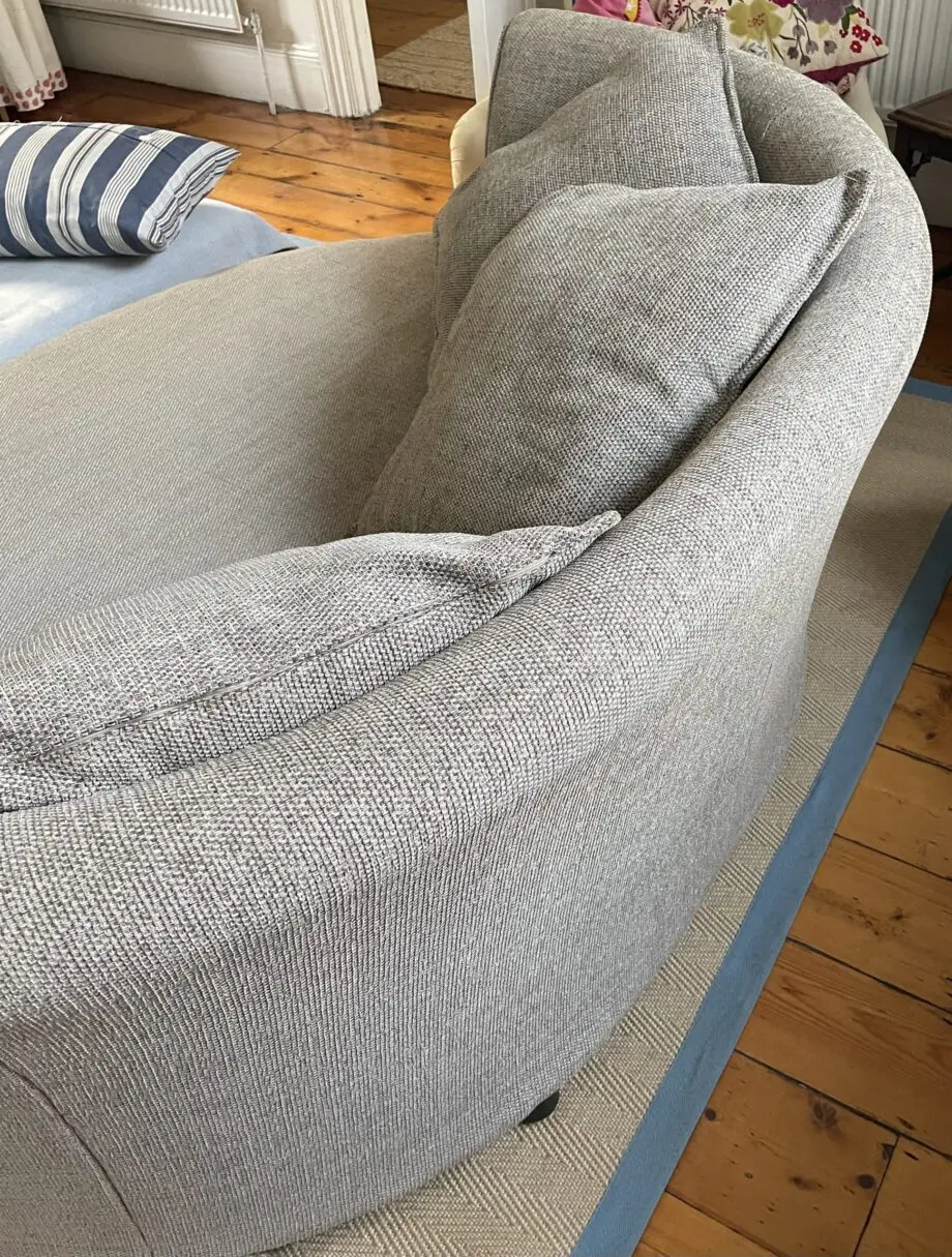 DFS beige boat shaped sofa, perfect for cosy evenings in front of the telly. Good as new.