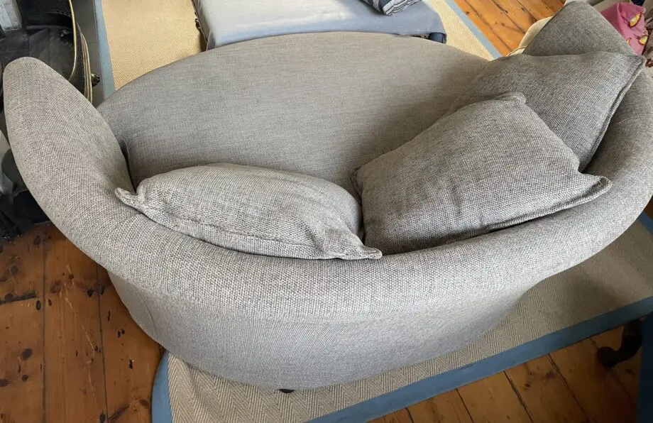 DFS beige boat shaped sofa, perfect for cosy evenings in front of the telly. Good as new.