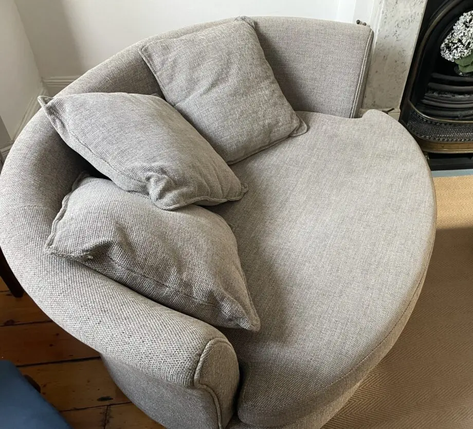 DFS beige boat shaped sofa, perfect for cosy evenings in front of the telly. Good as new.