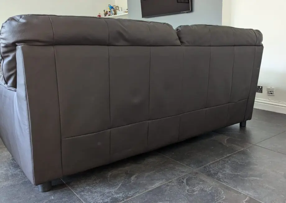 Milano Faux Chocolate color 3 seater Leather Sofa - Used-1 yr old in very good Condition from Smoke and Pet free home