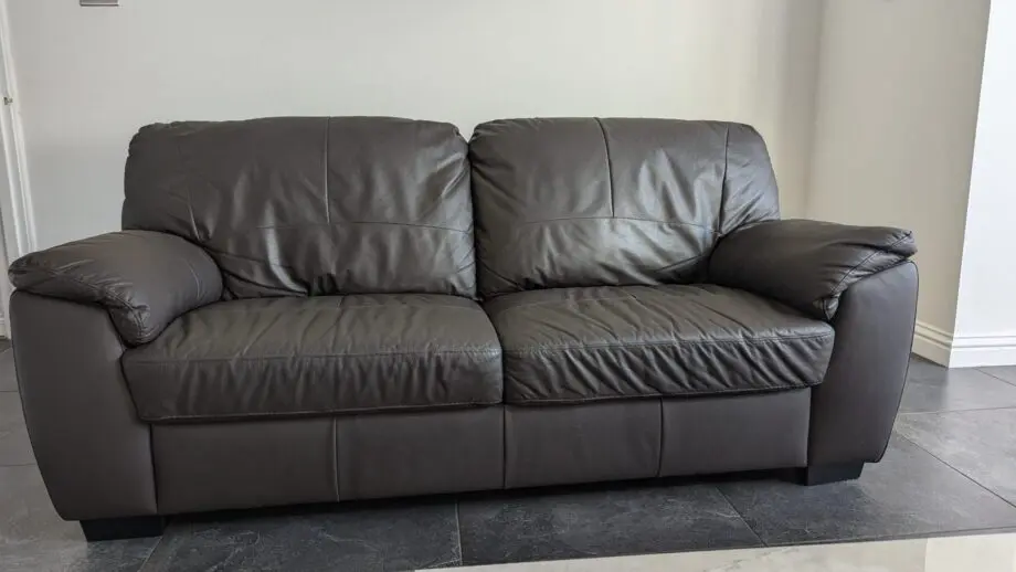 Milano Faux Chocolate color 3 seater Leather Sofa - Used-1 yr old in very good Condition from Smoke and Pet free home