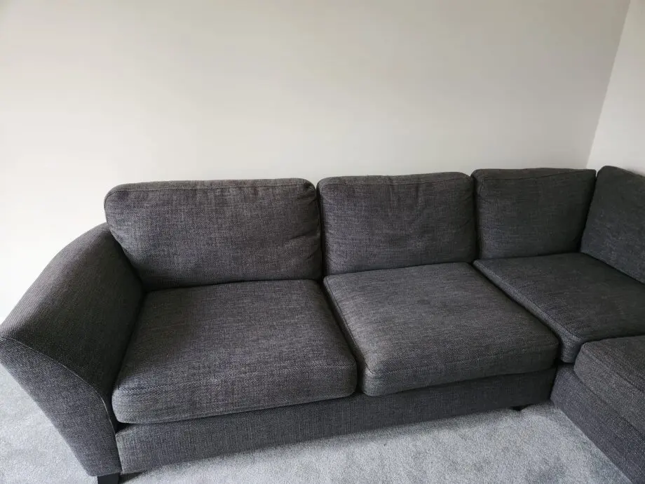 DFS Grey corner sofa with foot stool