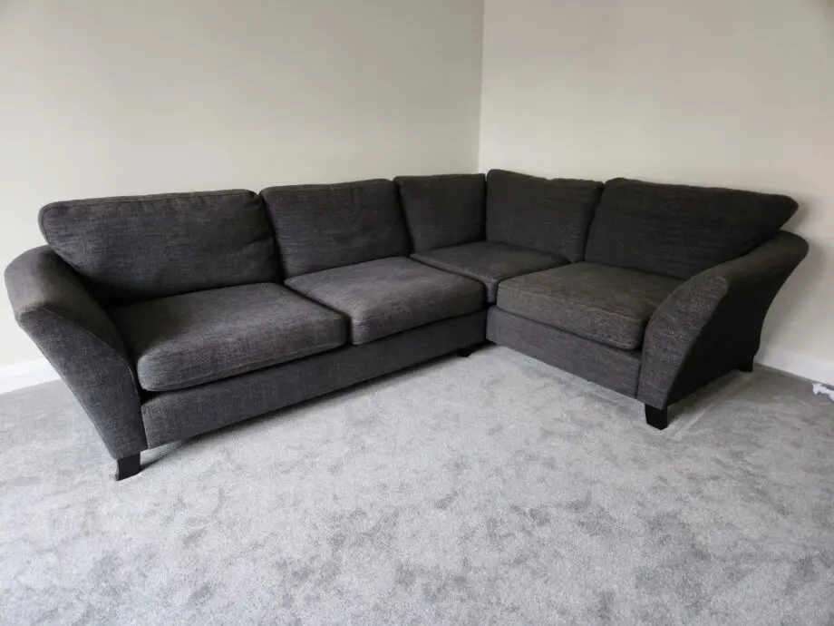 DFS Grey corner sofa with foot stool
