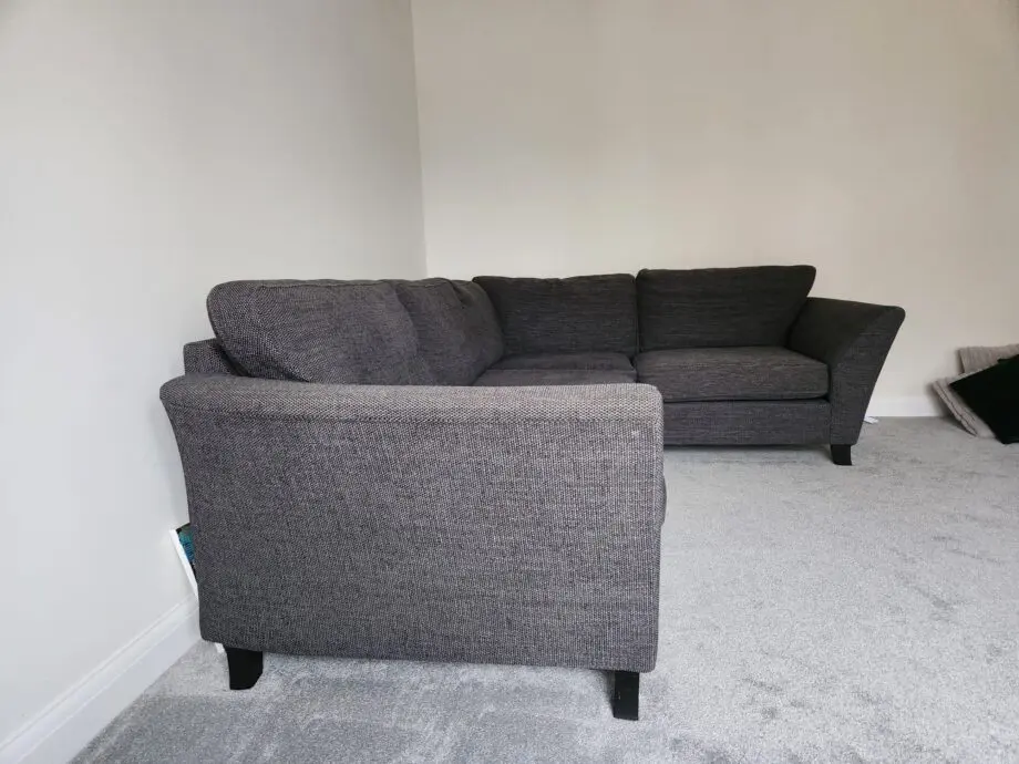 DFS Grey corner sofa with foot stool