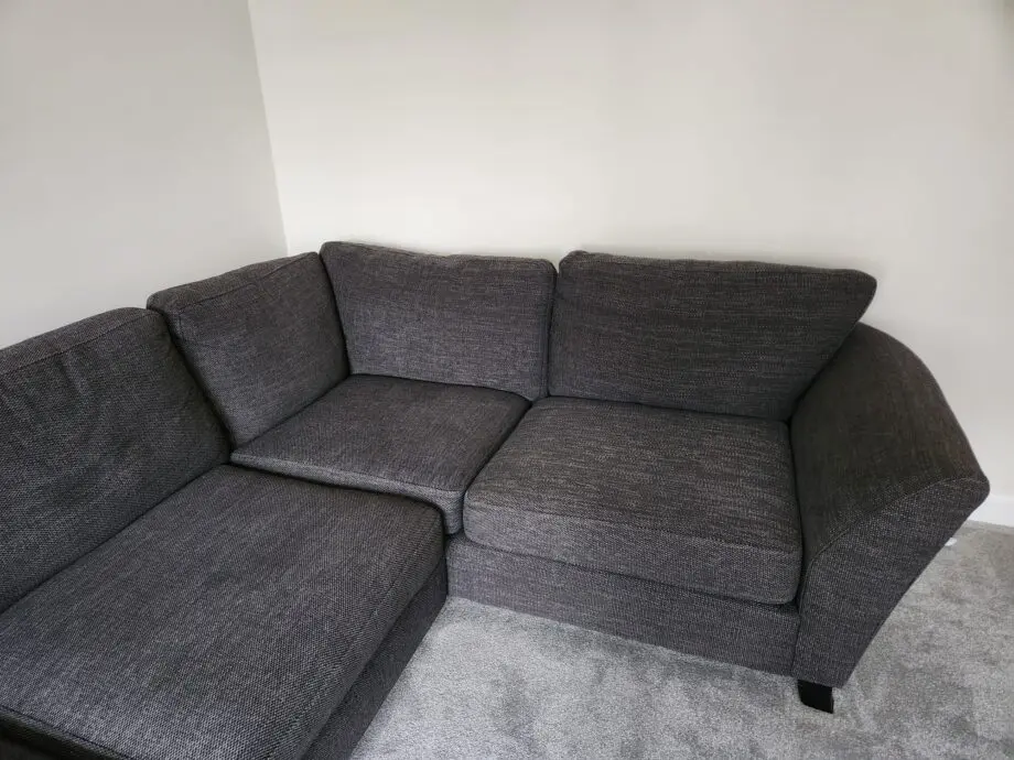 DFS Grey corner sofa with foot stool