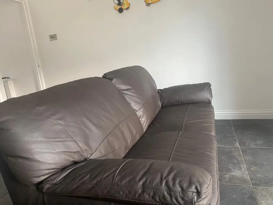Milano Faux Chocolate color 3 seater Leather Sofa - Used-1 yr old in very good Condition from Smoke and Pet free home