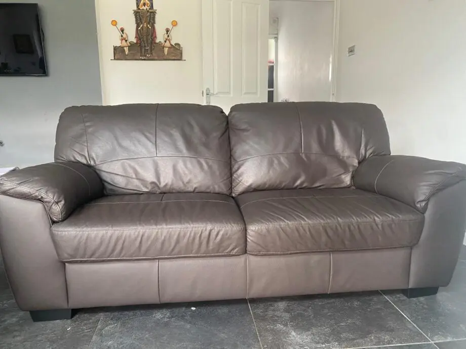 Milano Faux Chocolate color 3 seater Leather Sofa - Used-1 yr old in very good Condition from Smoke and Pet free home