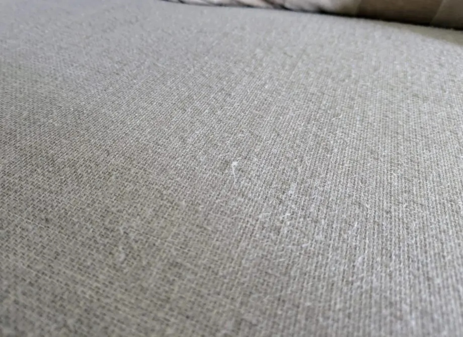 DFS corner sofa with scatter cushions, light grey and neutral cushions which are ikea
