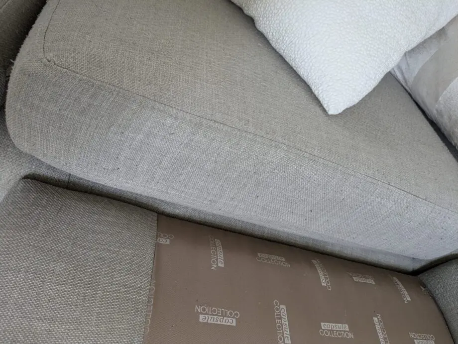 DFS corner sofa with scatter cushions, light grey and neutral cushions which are ikea