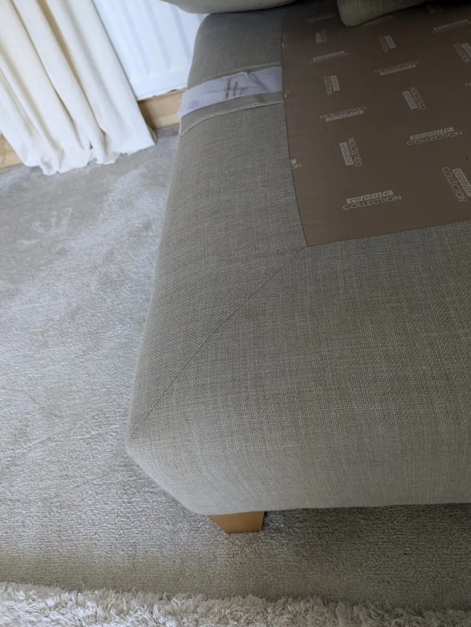 DFS corner sofa with scatter cushions, light grey and neutral cushions which are ikea