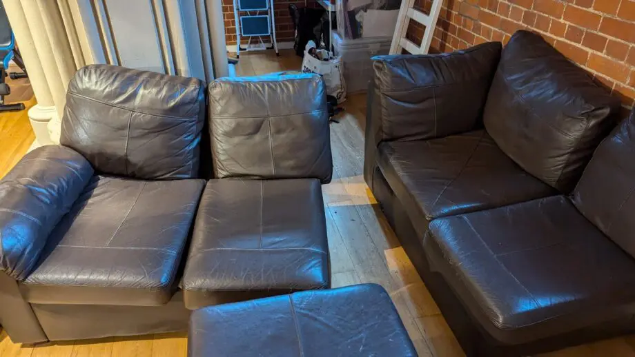 Small L-shaped brown leatherette sofa