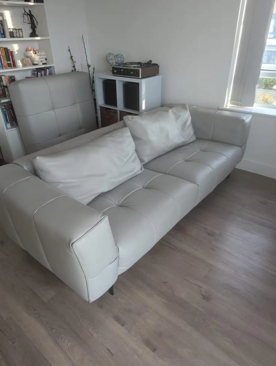 Leather couch with foot stool
