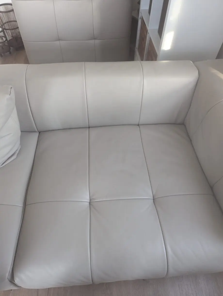 Leather couch with foot stool