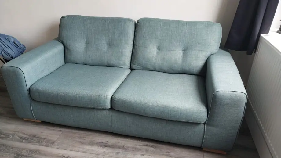 DFS 3 seater sofa. Green colour