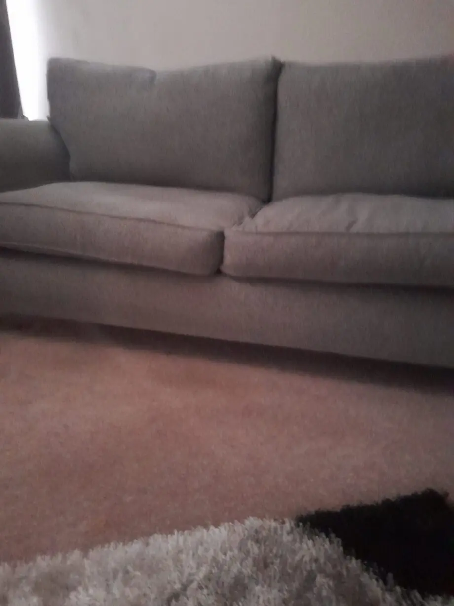 2 seater sofa new grey in colour