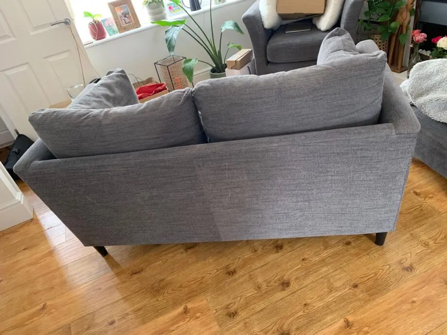 Grey IKEA sofa, armchair, and footstool