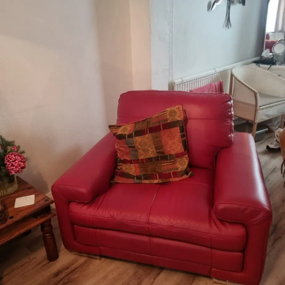 Red leather sofa and chair