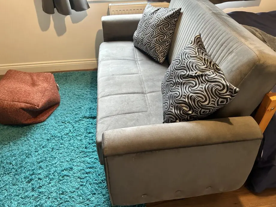 Comfort Meets Functionality! Grey 2-Seater Sofa Bed with Storage + Cushions 🛋️