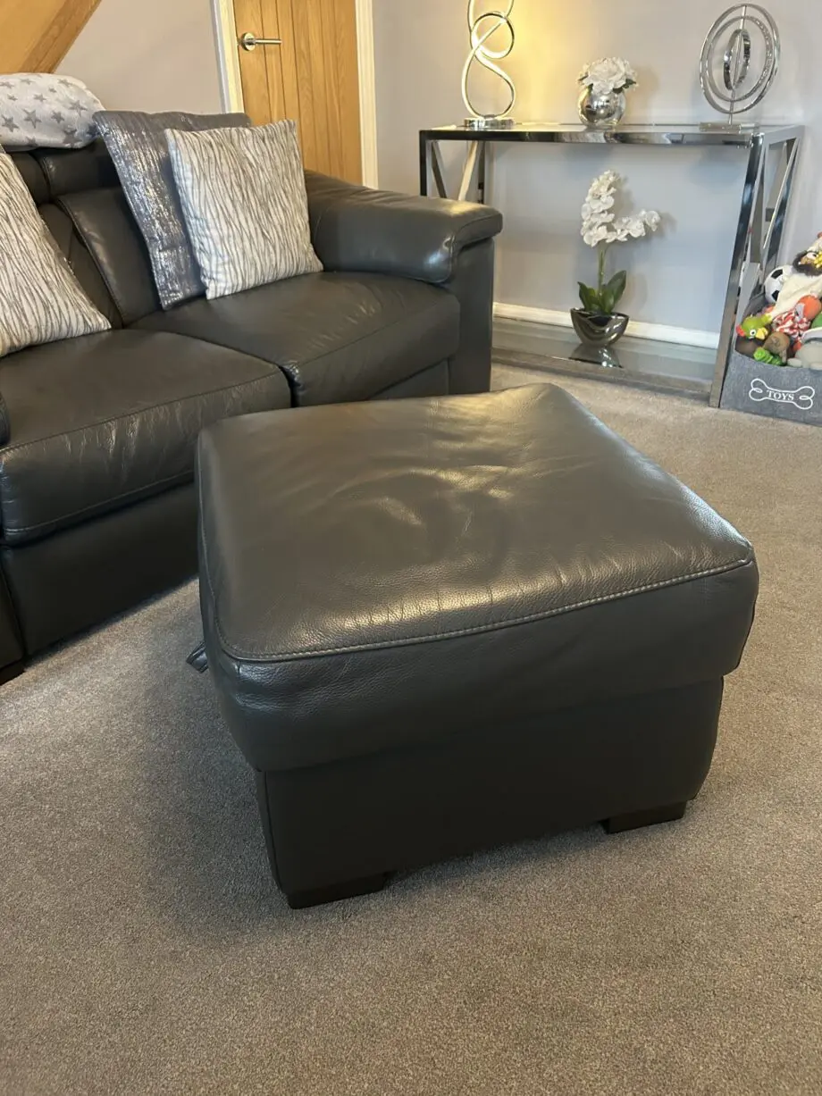 2 grey leather recliner sofas