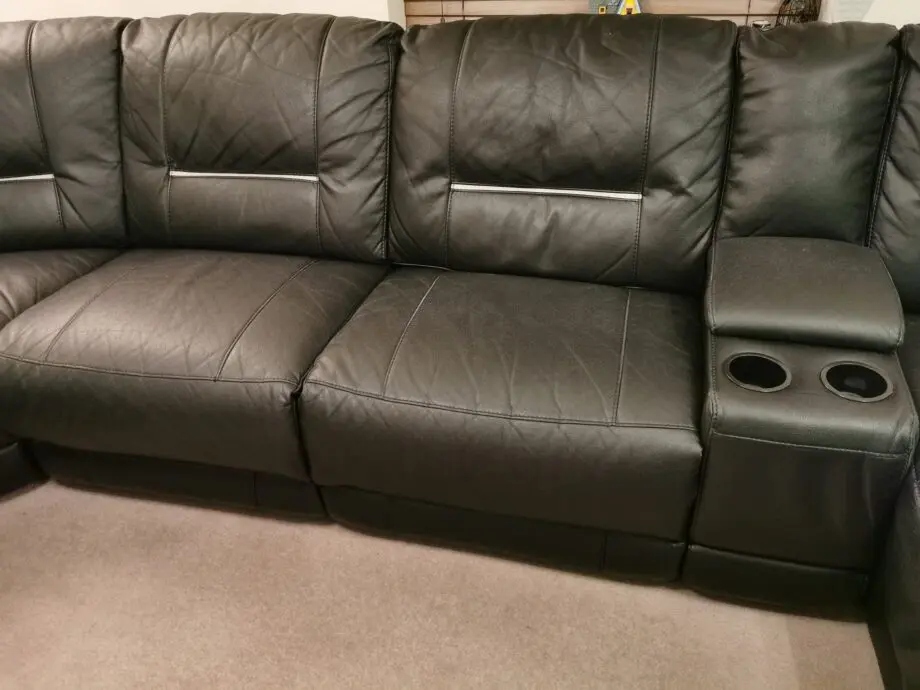 Harvey's black corner chaise long with recliner
