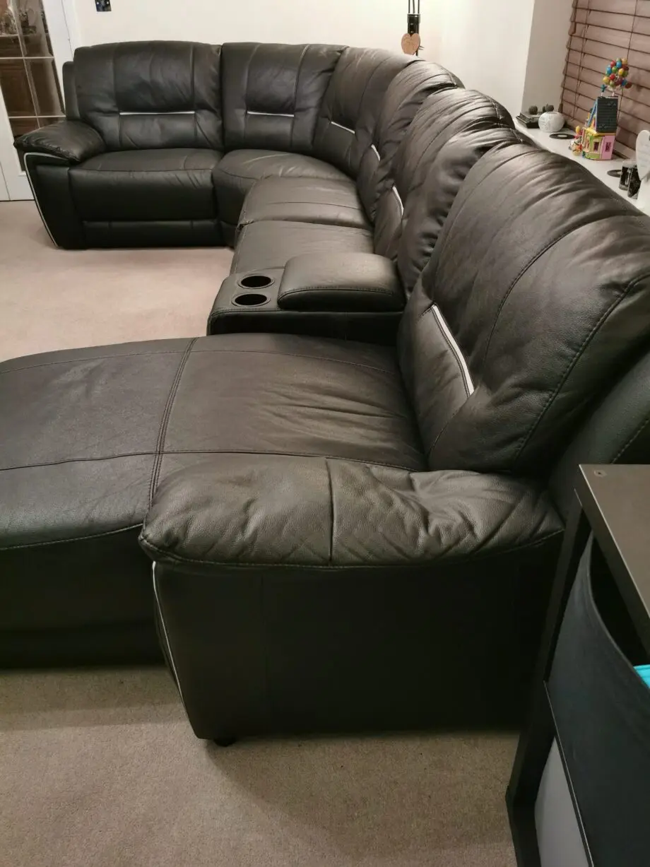 Harvey's black corner chaise long with recliner