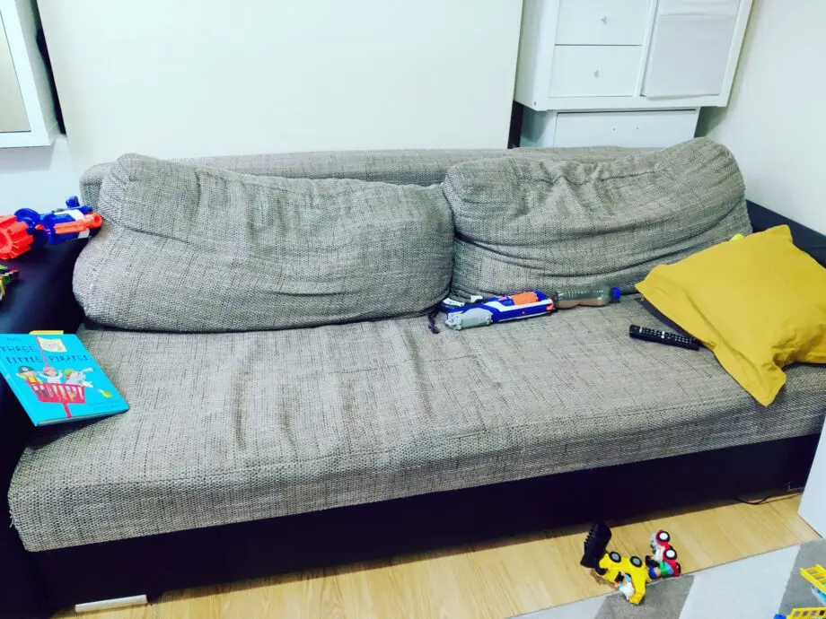 5 year old sofa,3-sitter,converts into double bed,storage underneath