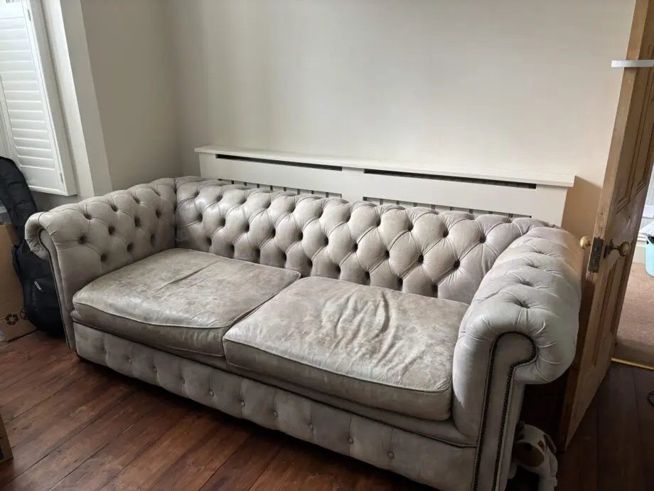 Beautiful grey leather chesterfield needs a new home!