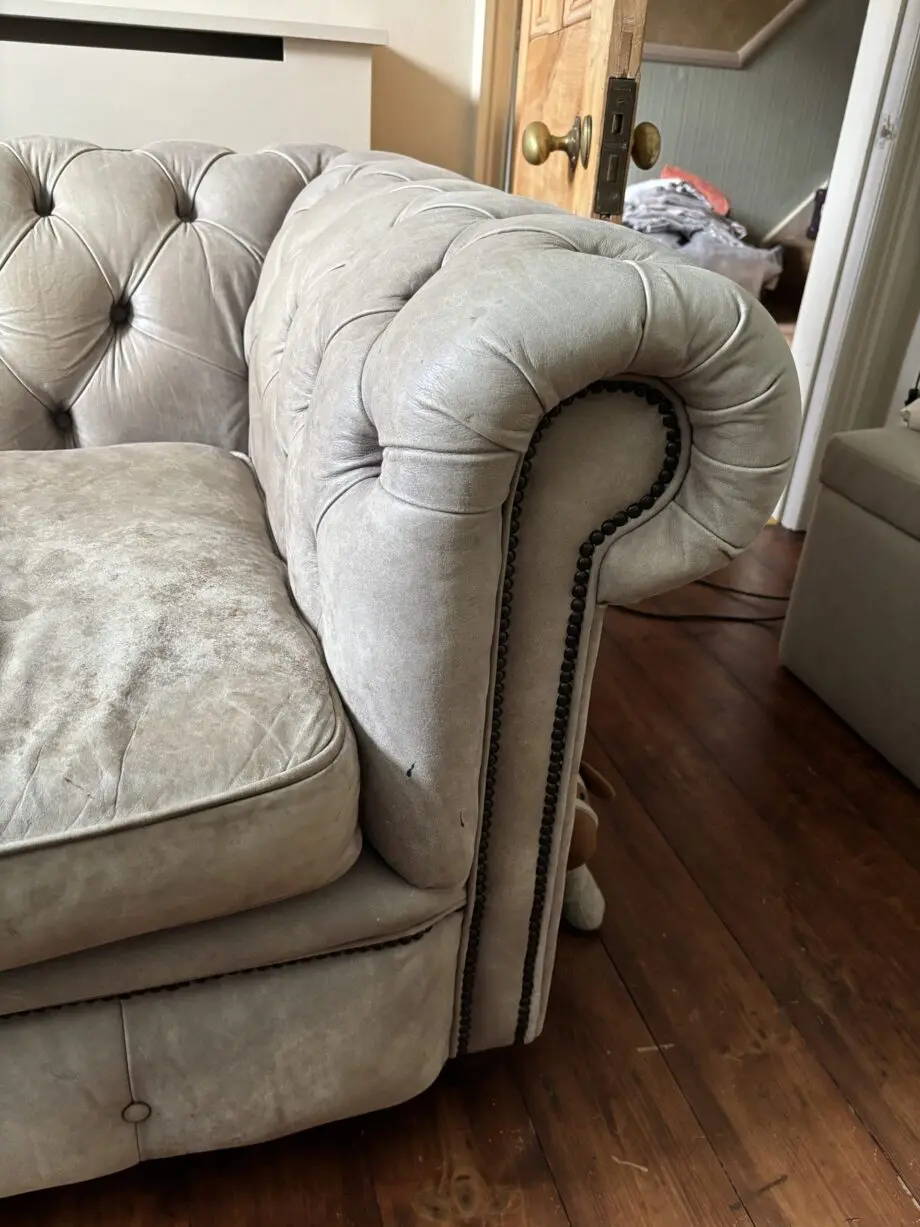 Beautiful grey leather chesterfield needs a new home!