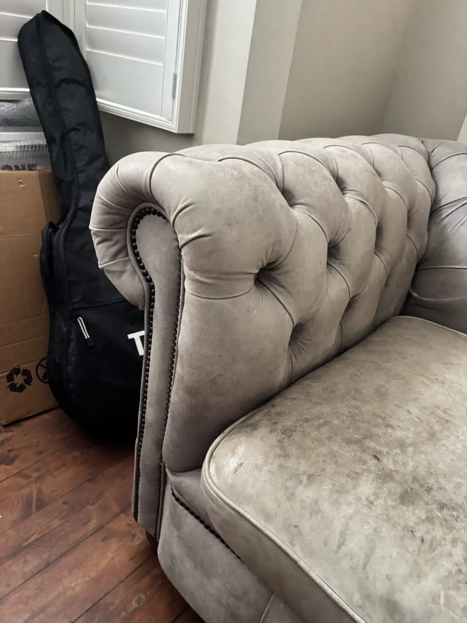 Beautiful grey leather chesterfield needs a new home!