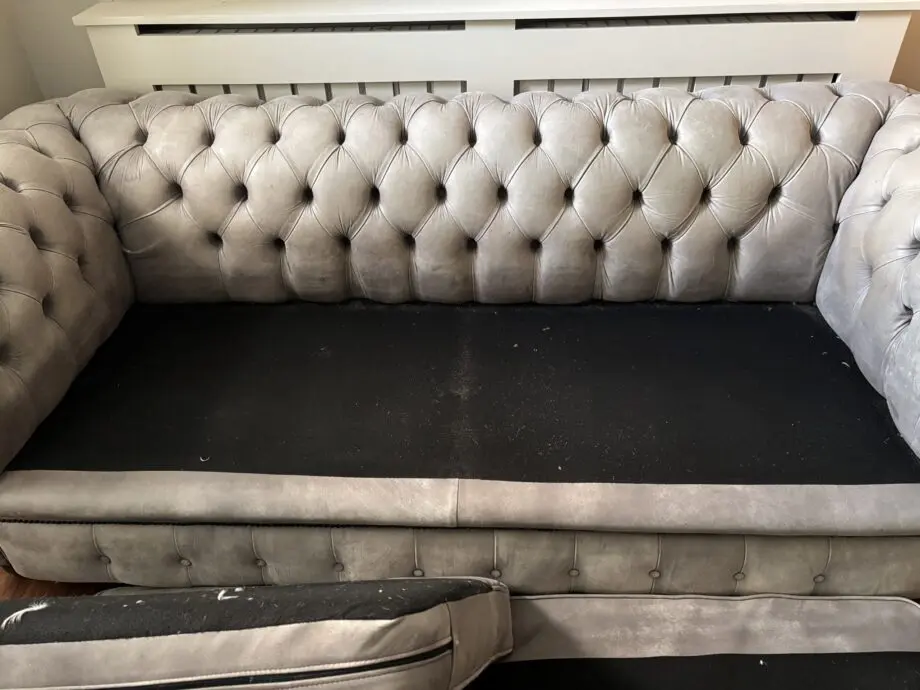 Beautiful grey leather chesterfield needs a new home!